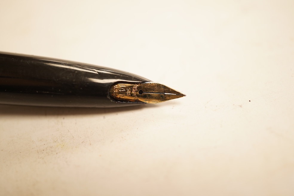 A Sheaffer 'White Spot' fountain pen with 14K gold nib and chevron decoration and three other pens